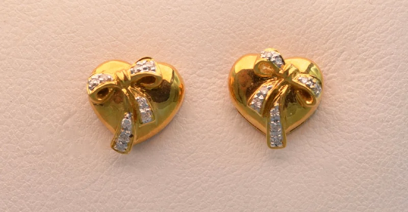 Ladies Earrings with Purple Stichtite-18k yellow gold, heart-shaped post  earrings with diamond bows.