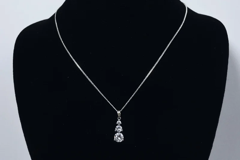 Playful shine necklaces -Avon - Sterling Silver Graduated Cubic Zirconia Drop Pendant on Sterling Silver Chain Necklace - 16"