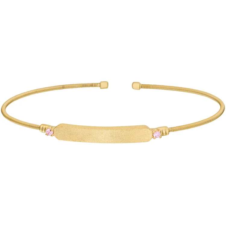 Ladies forest hush bracelets -Gold Finish Sterling Silver Cable Cuff Bracelet with Name Plate and Simulated Pink Sapphire Birth Gems - October