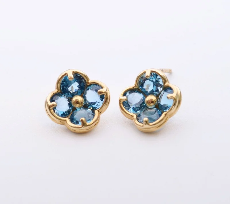 Ladies Earrings with Clear Natrolite-14K yellow gold flower-shaped post earrings with Blue Topaz