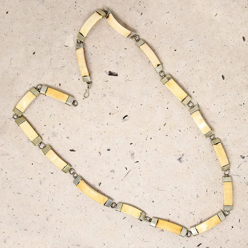 Valentine’s glow necklaces -Wild Warthog Tusk & Brass Necklace