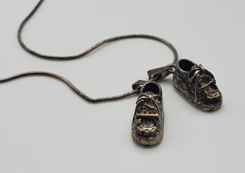 Orbit glow necklaces -Vintage Sterling Silver Baby Shoe Pendants on Sterling Silver Necklace - 24"