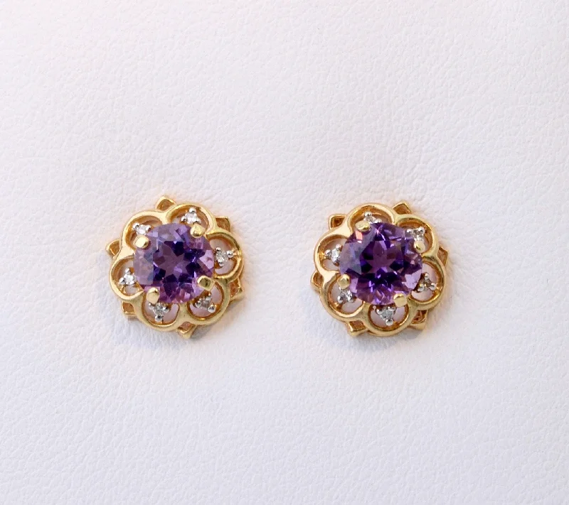 Ladies Earrings for Artist Spark-14K yellow gold post earrings with one center Amethyst and six Diamonds