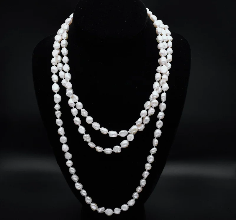 High sheen necklaces -Single Strand Rope Necklace of Semi-Baroque Cultured Pearls - 63"