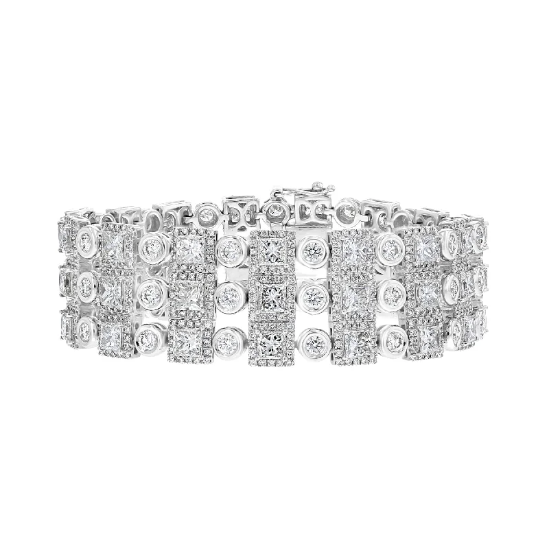 Ladies playful charm bracelets -18KT White Gold 24.33 CTW Diamond Bezel & Halo Bracelet