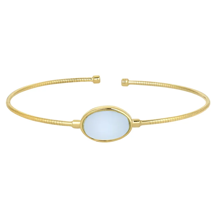 Ladies starry veil bracelets -Gold Finish Sterling Silver Rounded Omega Cable Cuff Bracelet with an Oval Light Blue Murano Stone