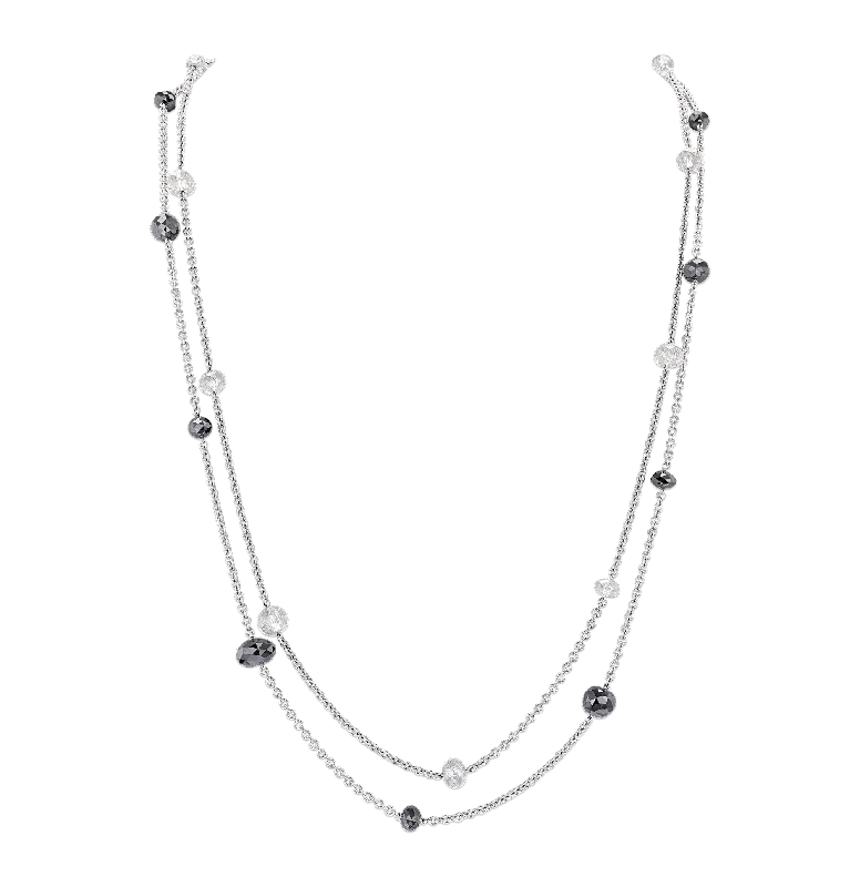 Angular geometric necklaces -Pair of White & Black Diamond Station Necklaces, 59.53 carats