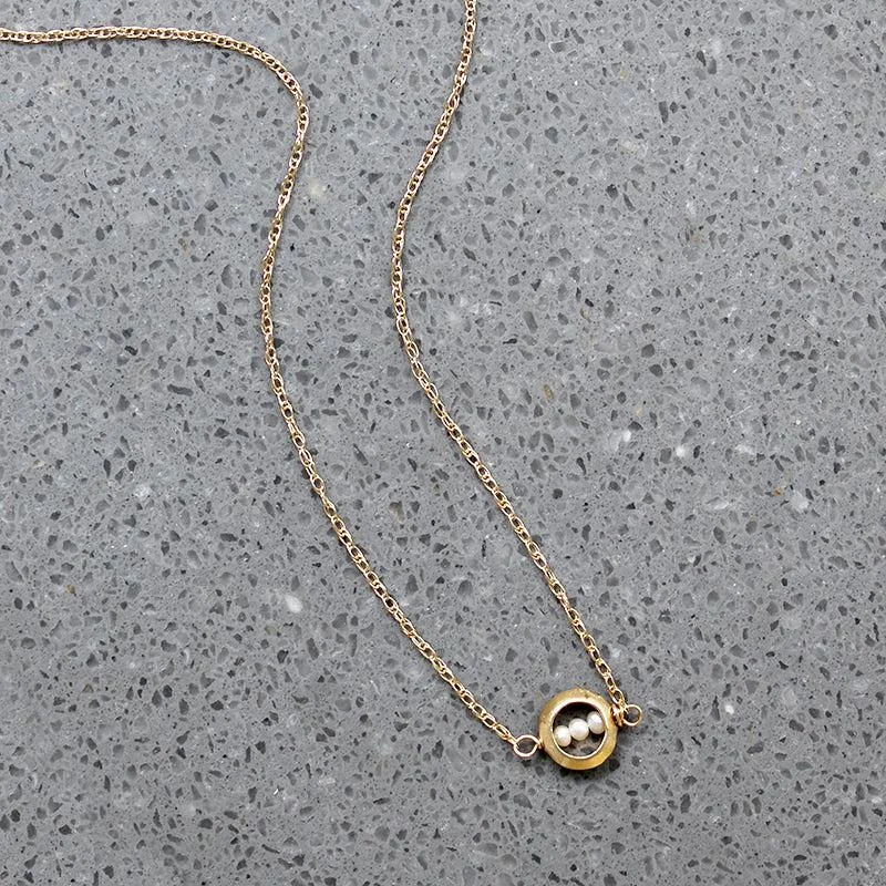 Calm blue necklaces -Dainty White Pearls in Gold "O" Necklace by brunet