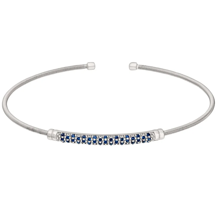 Ladies peaceful flow bracelets -Rhodium Finish Sterling Silver Cable Cuff Bracelet with Three Rows of Simulated Blue Sapphire Birth Gems - September