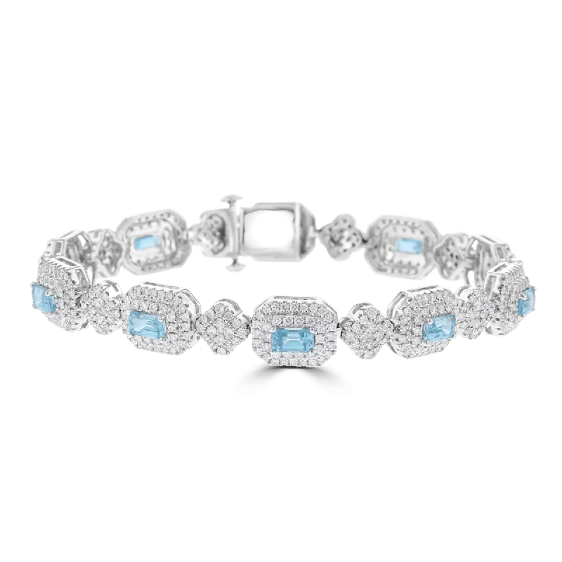 Ladies commanding bold bracelets -JULEVE 18KT 5.59 CTW BLUE ZIRCON & 3.33 CTW DIAMOND HALO BRACELET