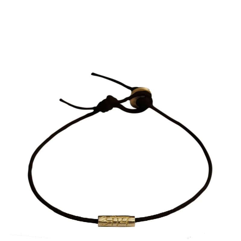 Ladies celestial star bracelets -10K Gold Om Tube Bracelet on Black Cord