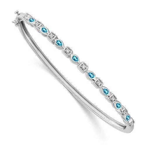 Ladies vivid painted bracelets -14KT WHITE GOLD BLUE TOPAZ AND DIAMOND BANGLE