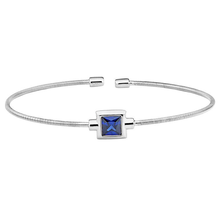 Ladies ancestral tribal bracelets -Rhodium Finish Sterling Silver Cable Cuff Bracelet with Princess Cut Simulated Blue Topaz Birth Gem