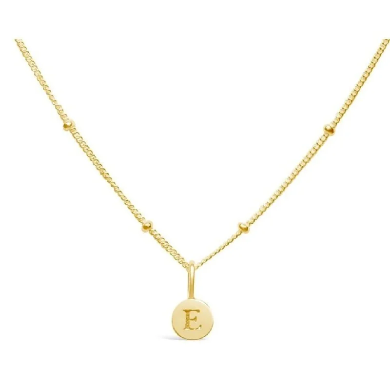 Cosmic charm necklaces -Stia : Love Letter "E" Mini Disk Necklace in Gold