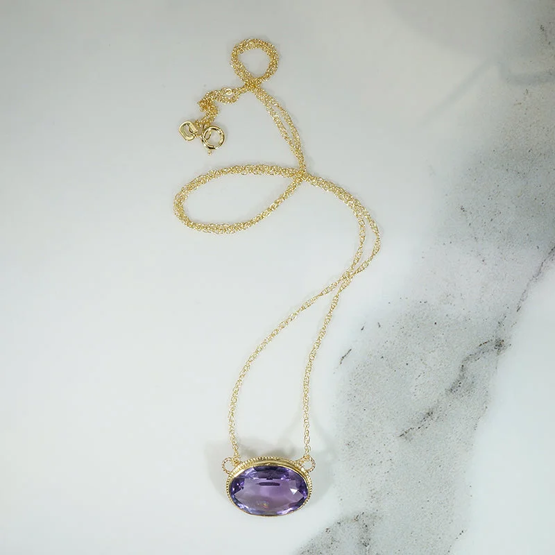 Bird flight necklaces -Vibrant Oval Amethyst in Gold Bezel Necklace