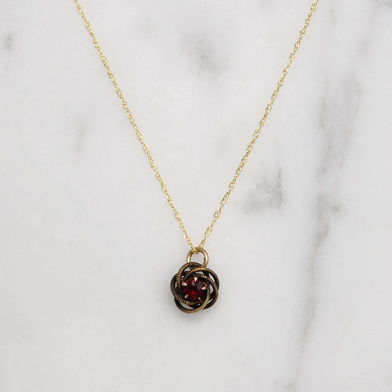 Galaxy spark necklaces -Engraved Gold & Garnet Wee Love Knot Necklace