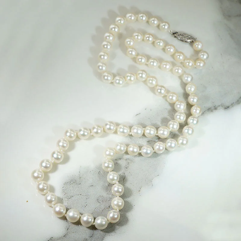 Inspiring spark necklaces -Glossy White 25.5" Pearl Necklace with White Gold Clasp